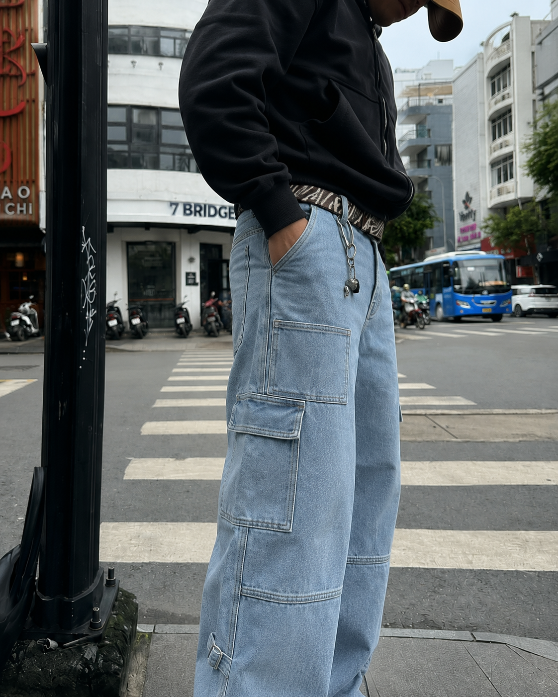 Light blue strap cargo pants pocket and strap detail