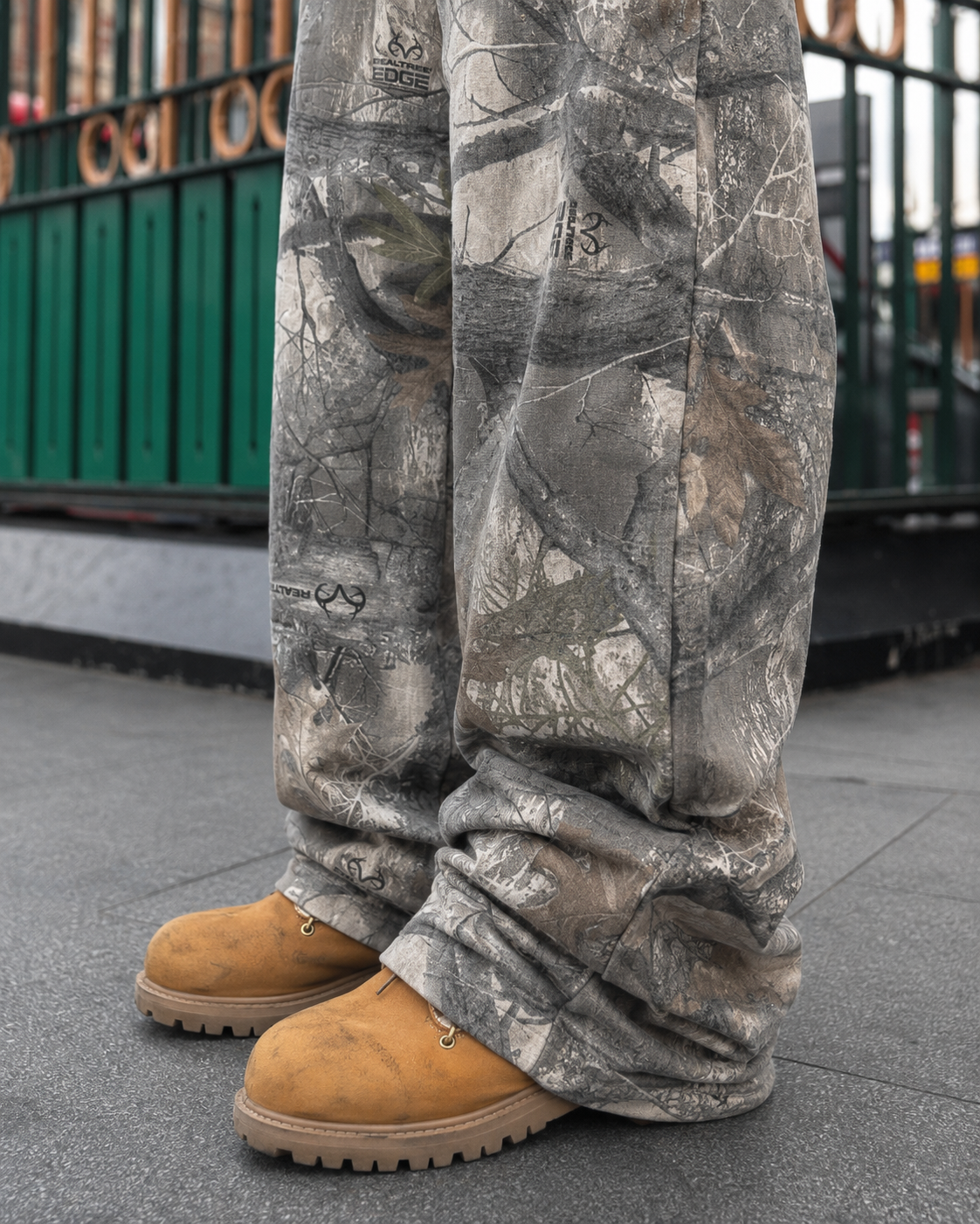 Grey baggy camo sweatpants stacked hem detail