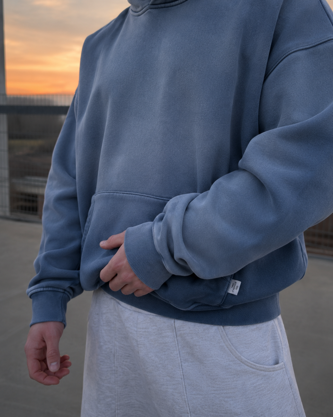Blue gradient hoodie oversized pocket sleeve detail