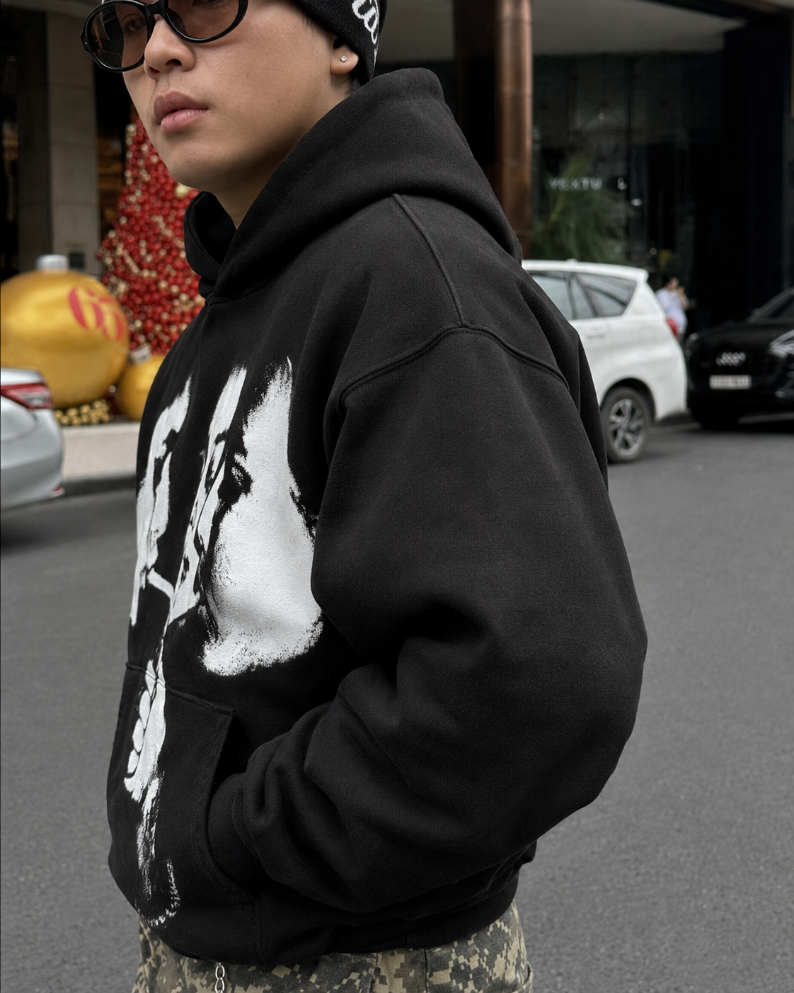 Black graphic hoodie sleeve detail