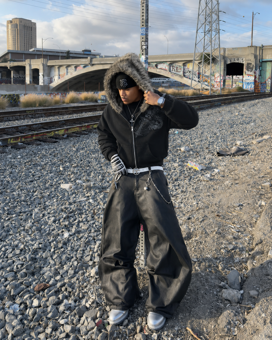 Black grunge faux fur zip up hoodie worn by man Y2K streetwear