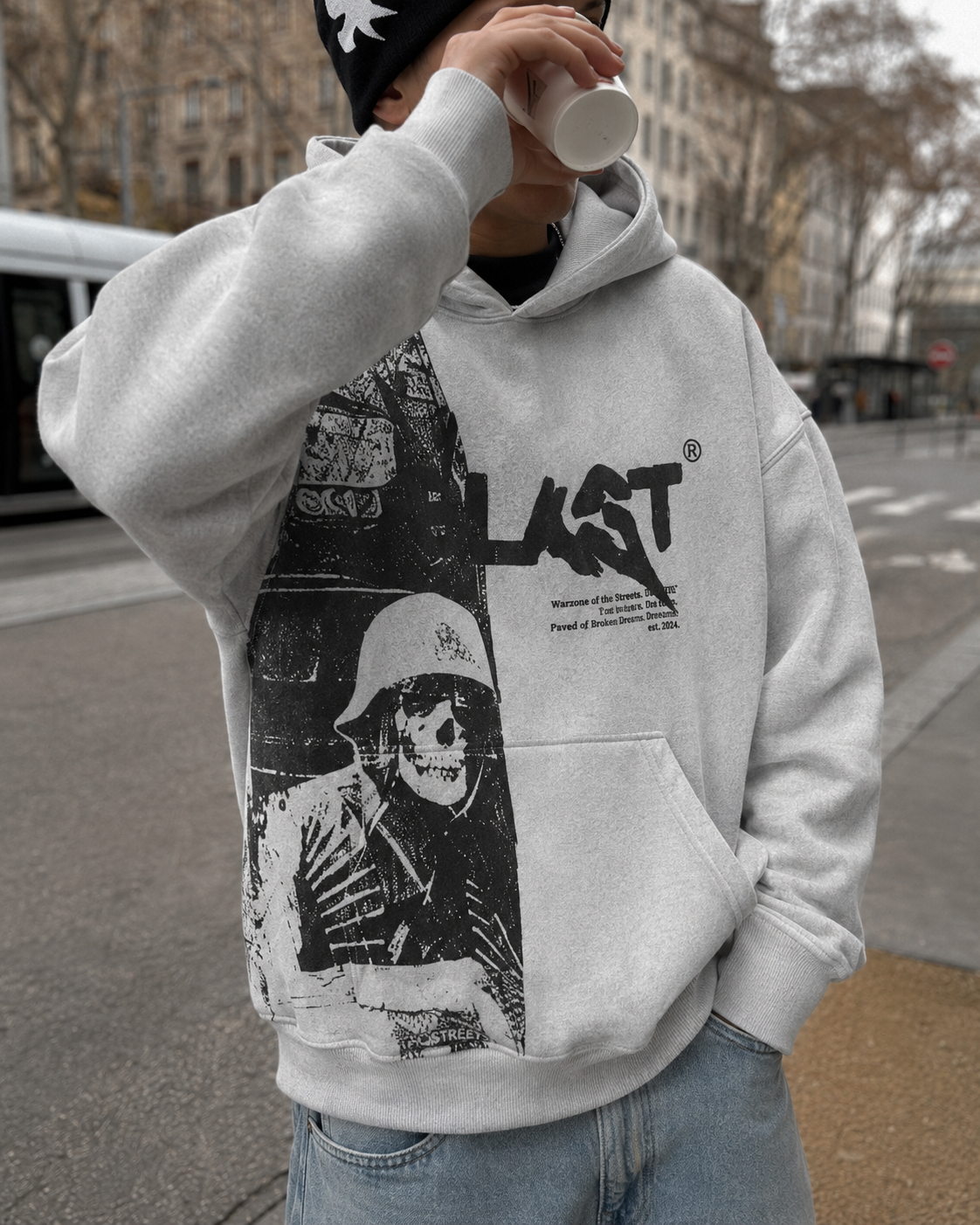 Hoodie Blast gris détail logo et squelette