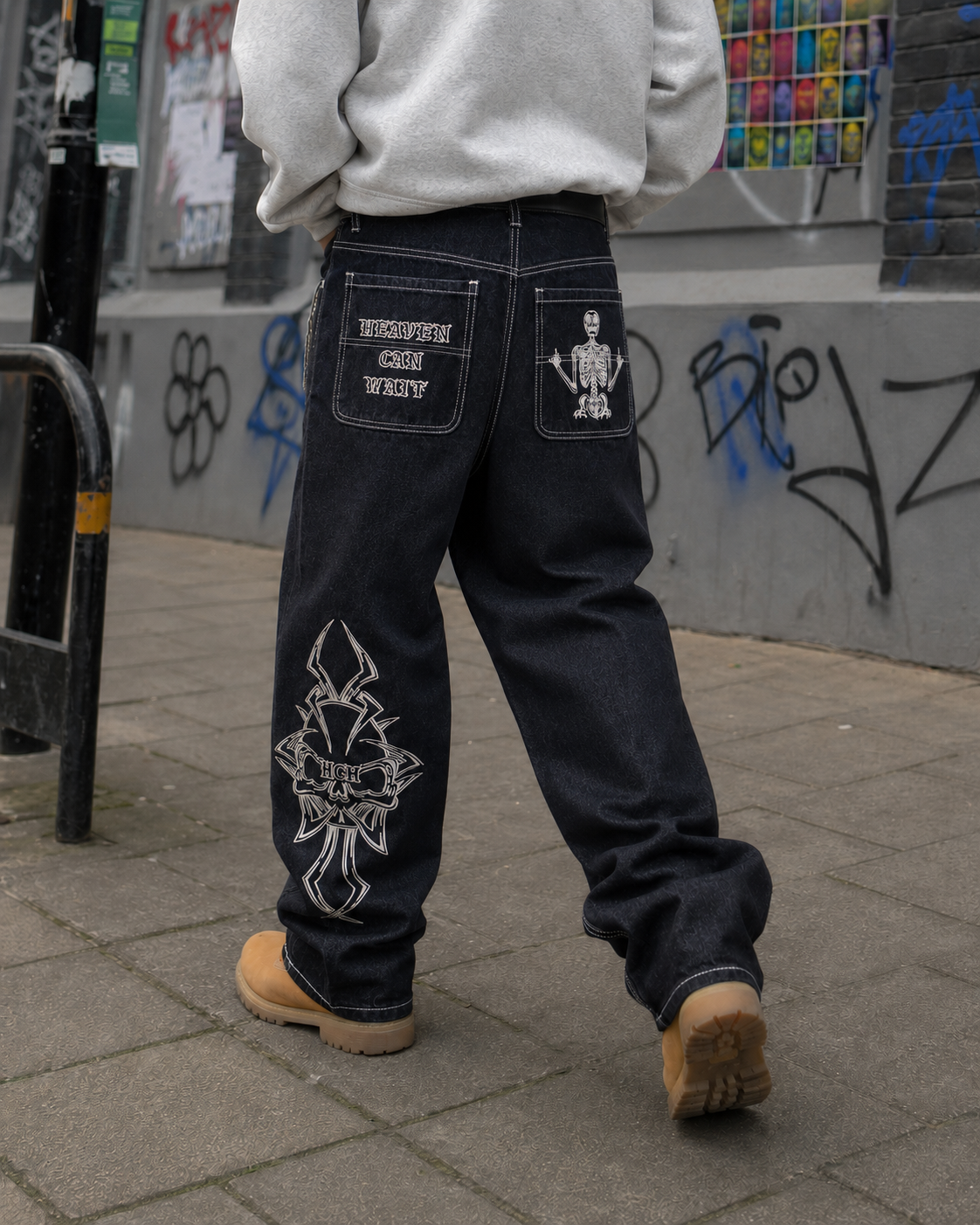 Back embroidery and tribal cross detail on jeans