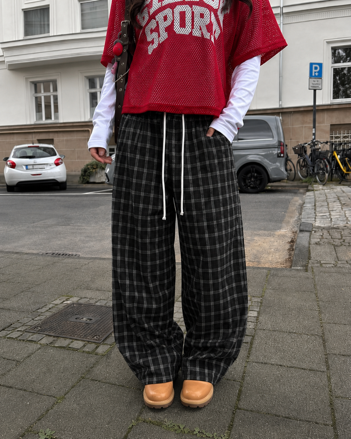 Black plaid pants drawstring waist detail worn