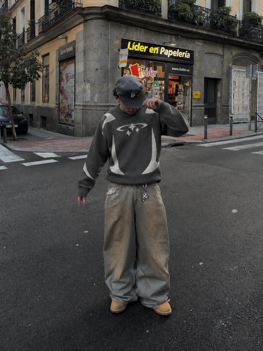 Grey Y2K graphic knit sweater worn front view