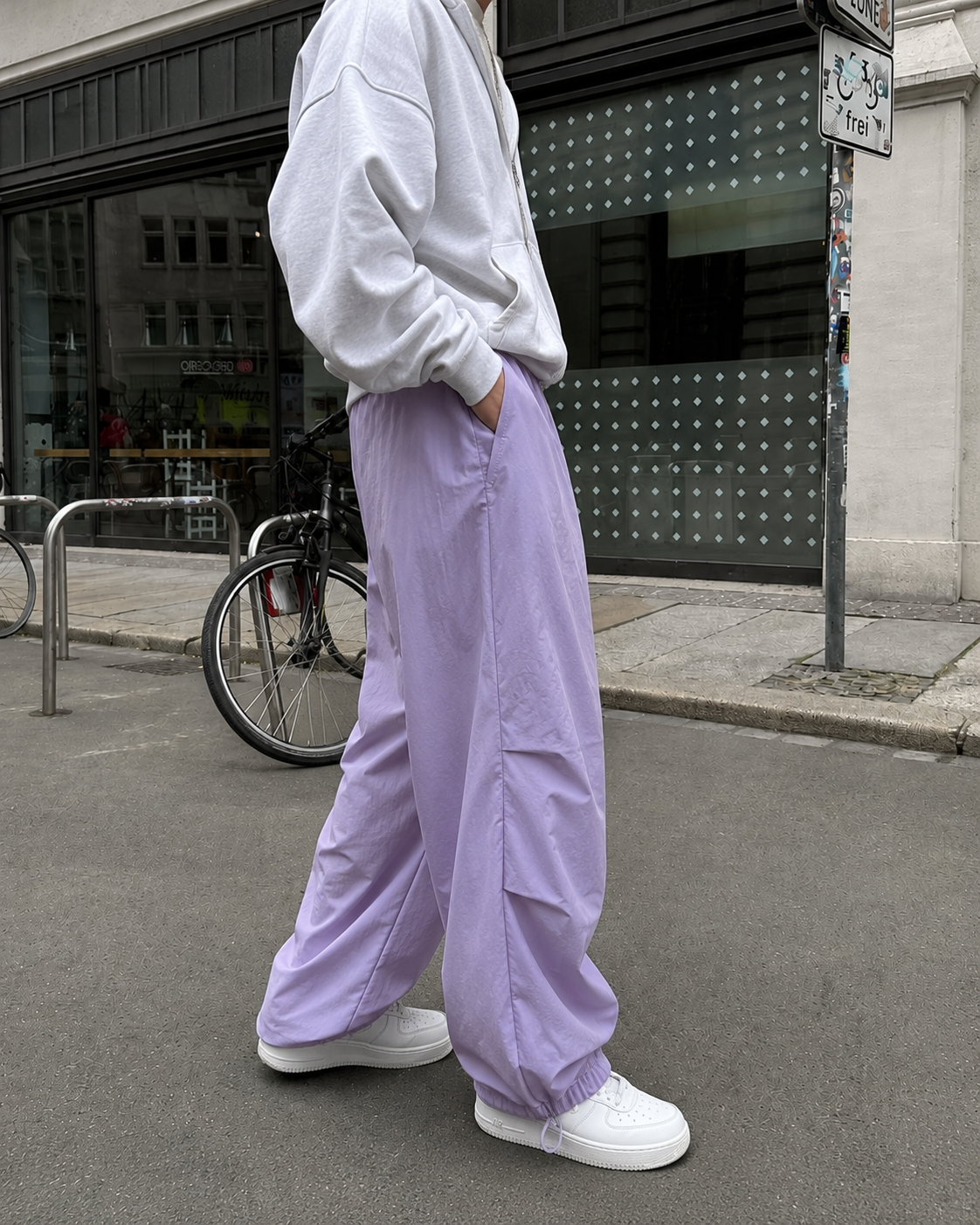 Purple wide-leg parachute pants side view