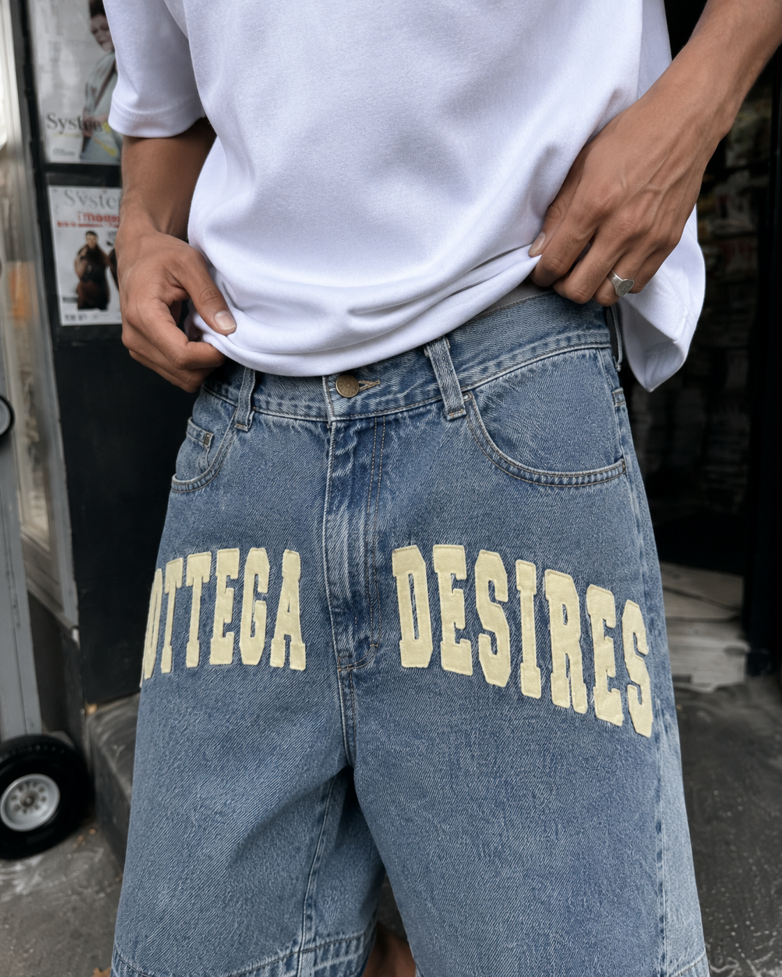 Bottega Desires blue shorts waist and lettering detail