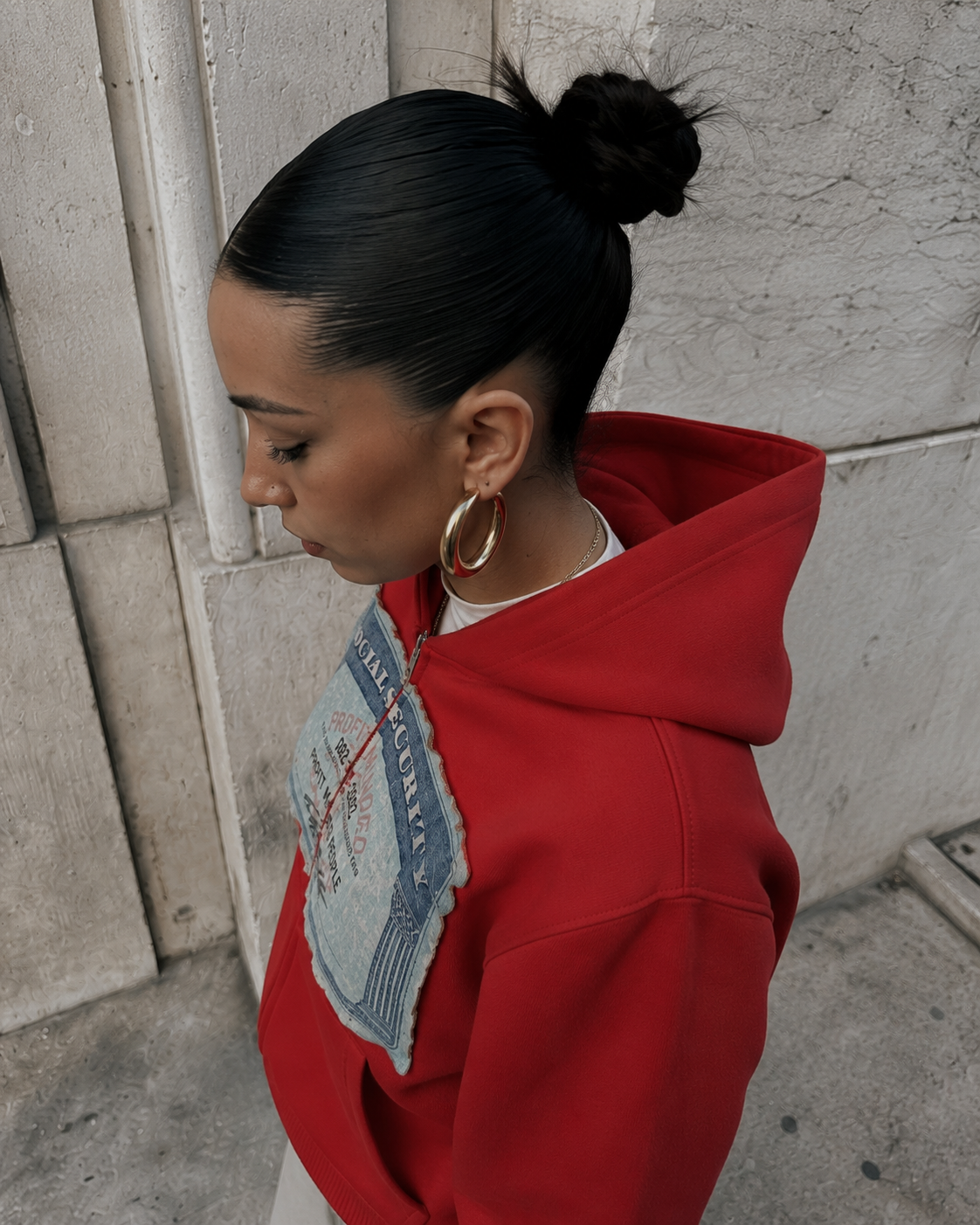 Red Social Security hoodie hood and zip detail