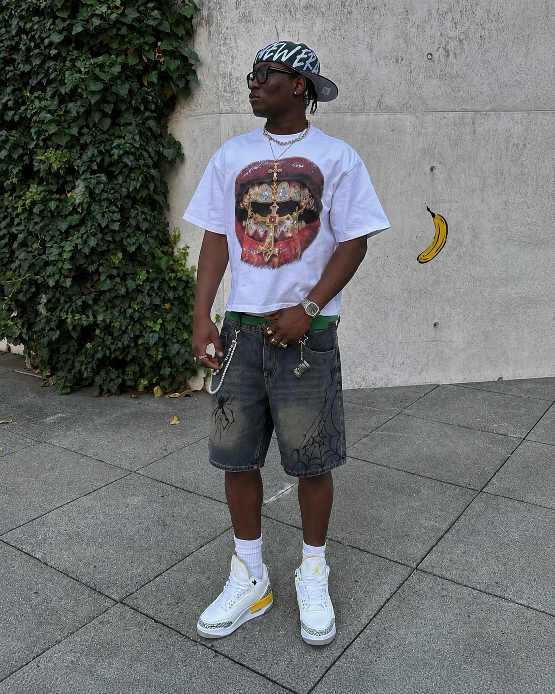 Spider Shorts worn in a Y2K streetwear outfit with graphic T-shirt