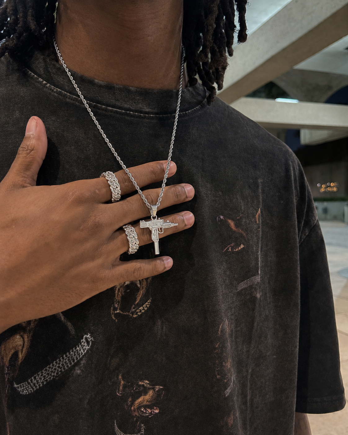 Silver UZI necklace worn streetwear pendant detail