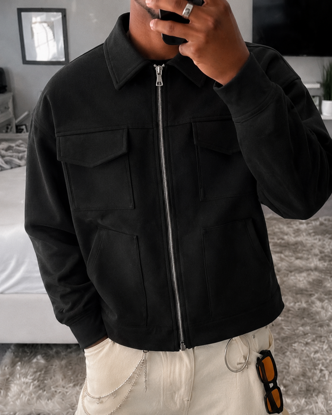 Veste workwear noire détail col zip et poches avant