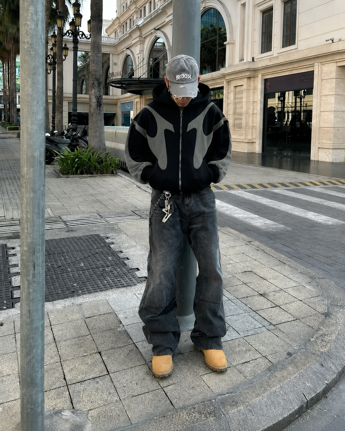 Black Y2K zip up hoodie with grey contrast panels worn from the front