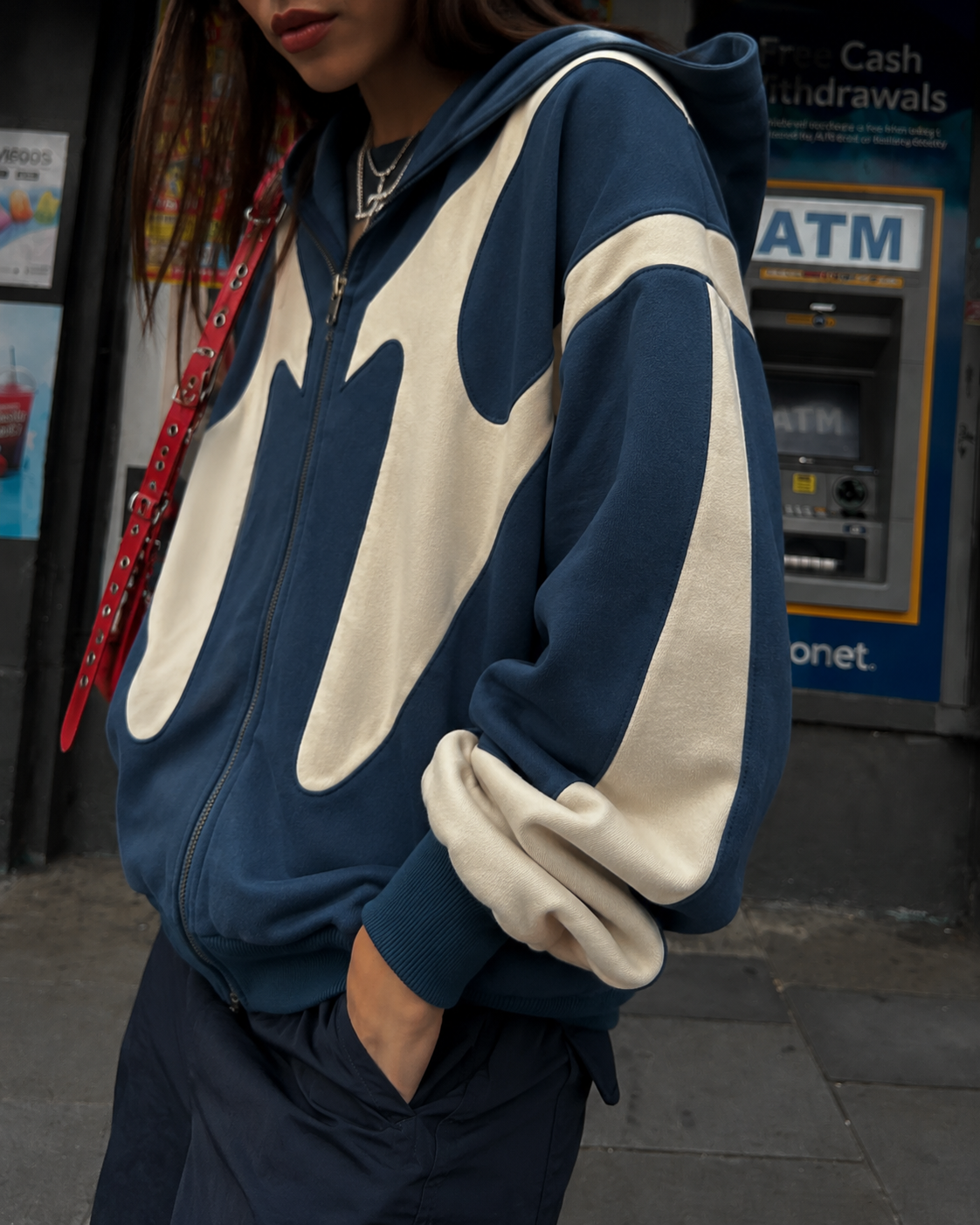 Blue Y2K zip up hoodie detail of the sleeve and cream panels