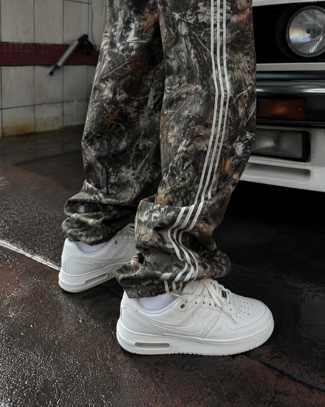Archive camo sweatpants stacked hem and side stripe detail