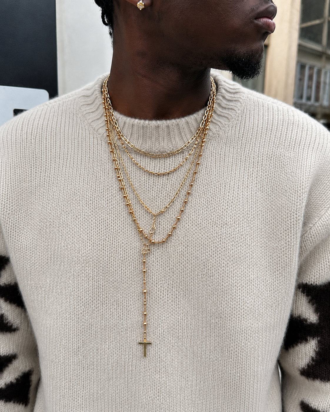 Beige chunky knit sweater crew neck texture black cross sleeves