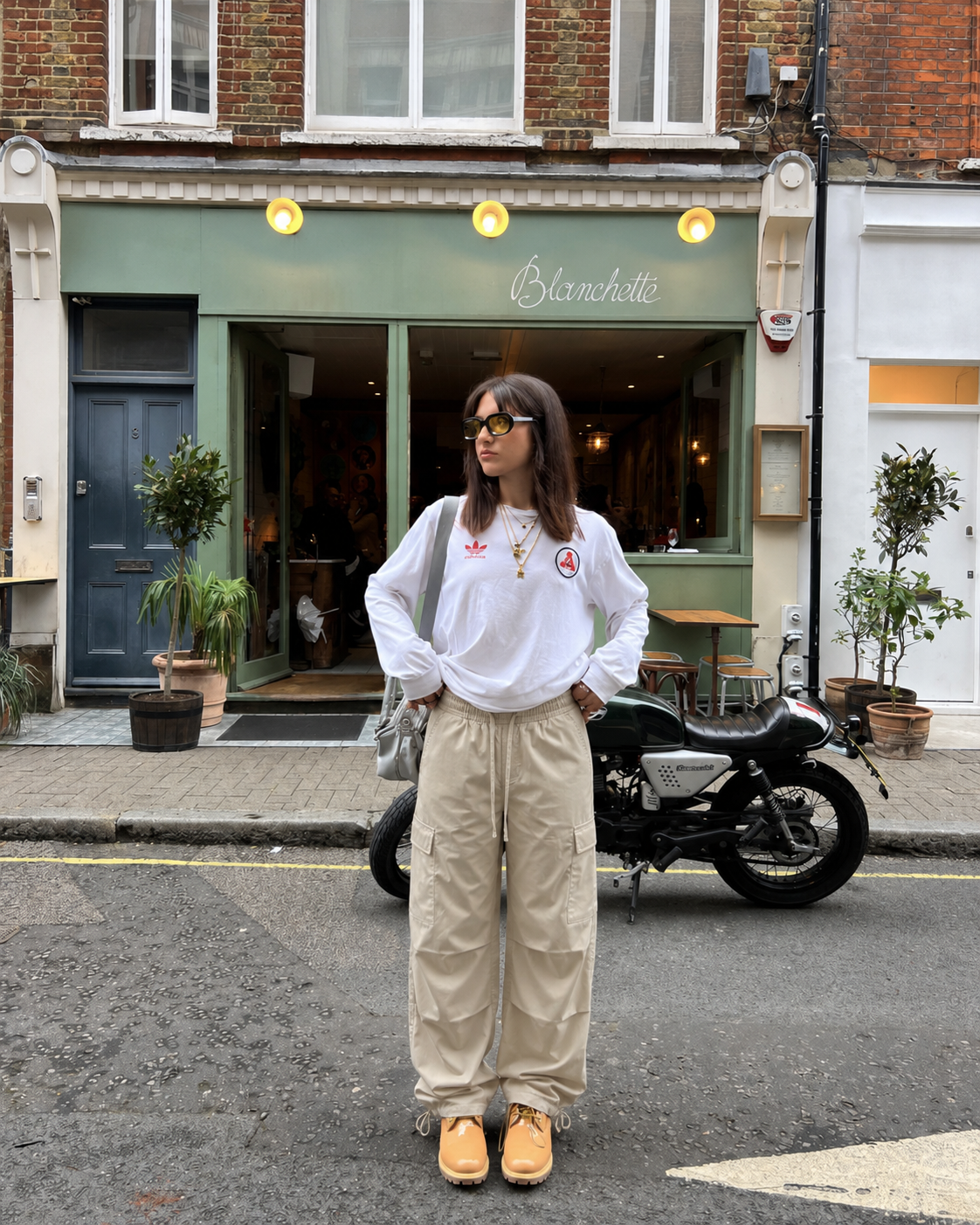 Beige parachute pants worn front view