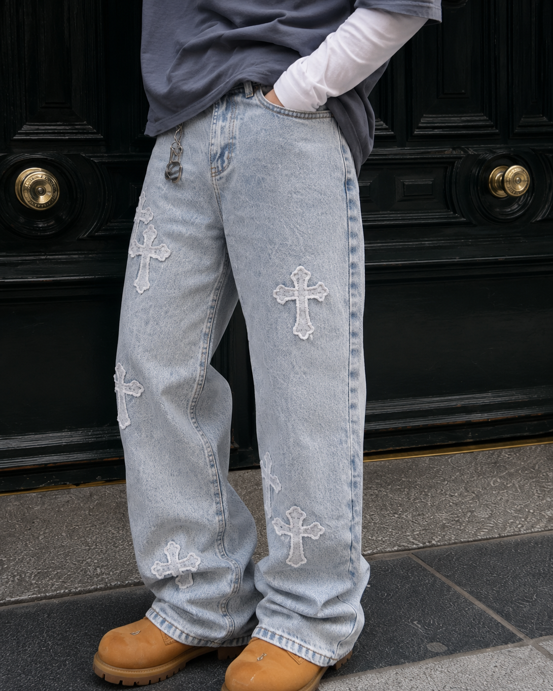 Light blue baggy jeans raised white cross detail