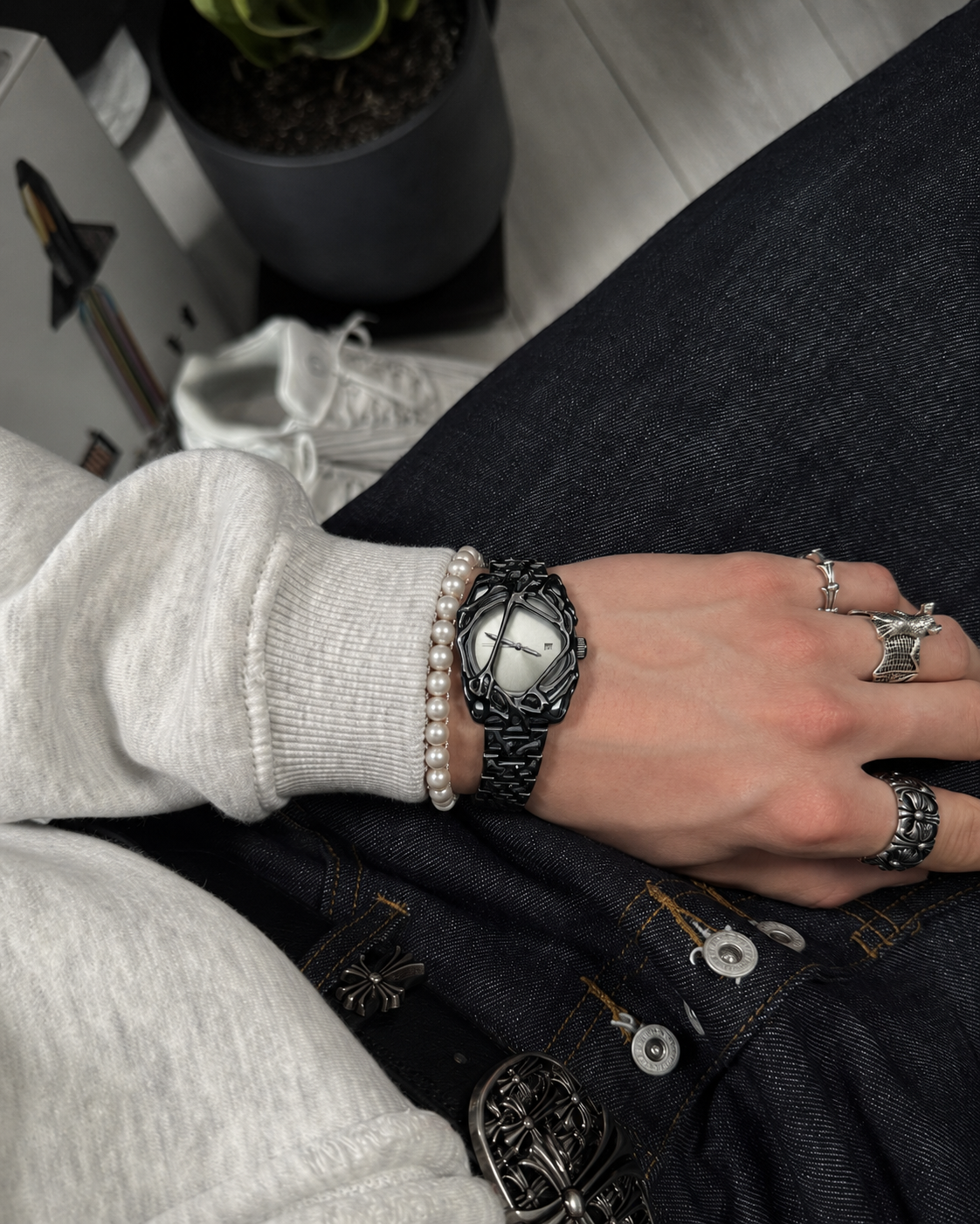 Black cyberpunk watch grey dial worn on wrist