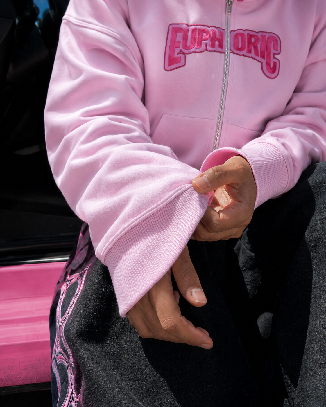 Oversized pink full zip hoodie sleeve cuff and Euphoric lettering detail