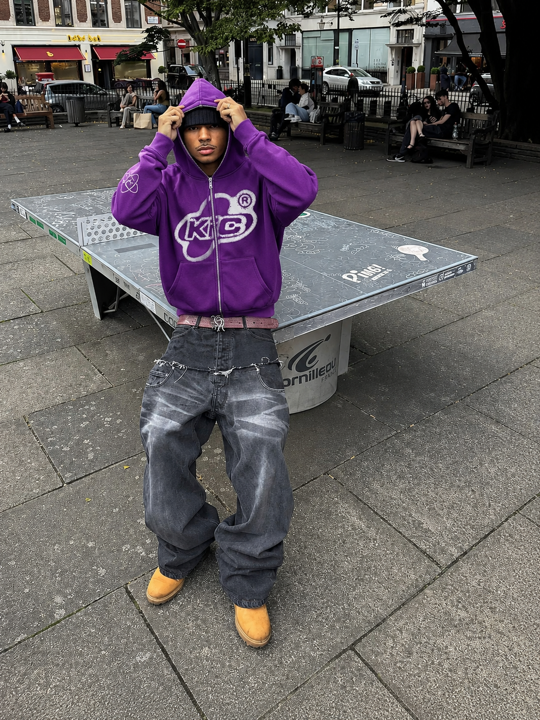 Purple Y2K full zip hoodie worn in park with white graphic