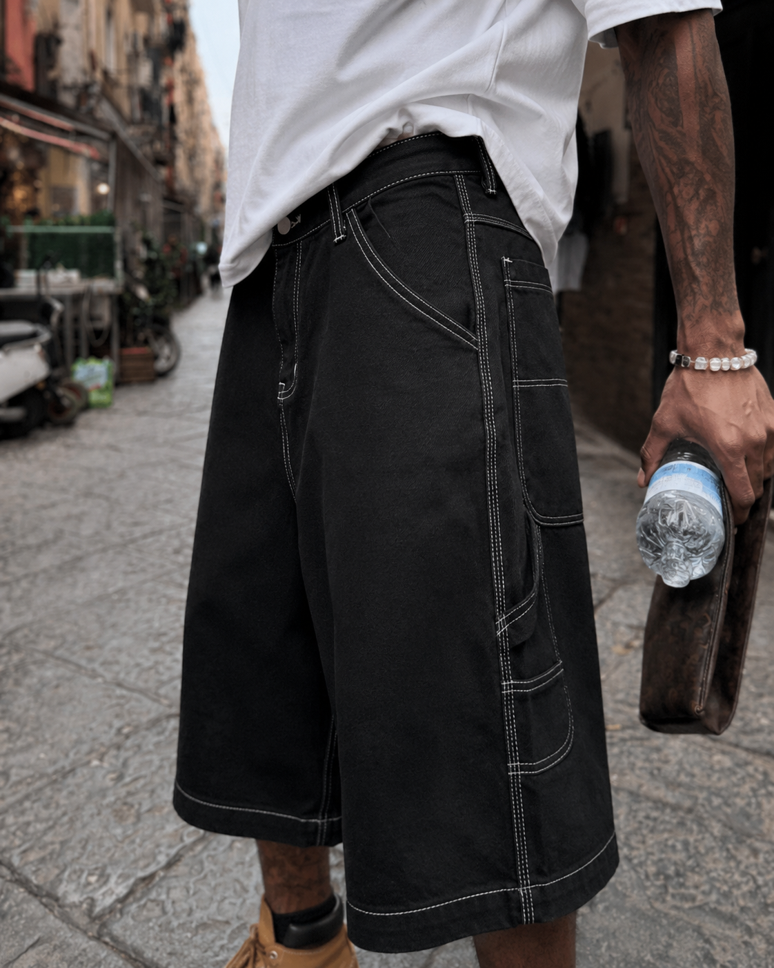 Detail of white contrast stitching and pockets on the Graffiti Jorts