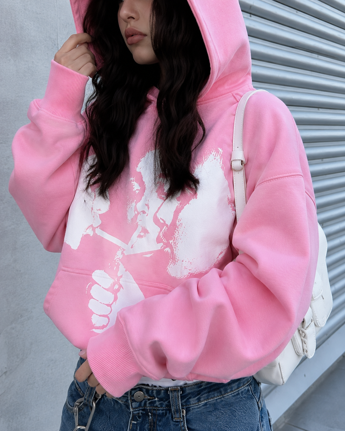 Pink graphic hoodie hood and sleeve detail
