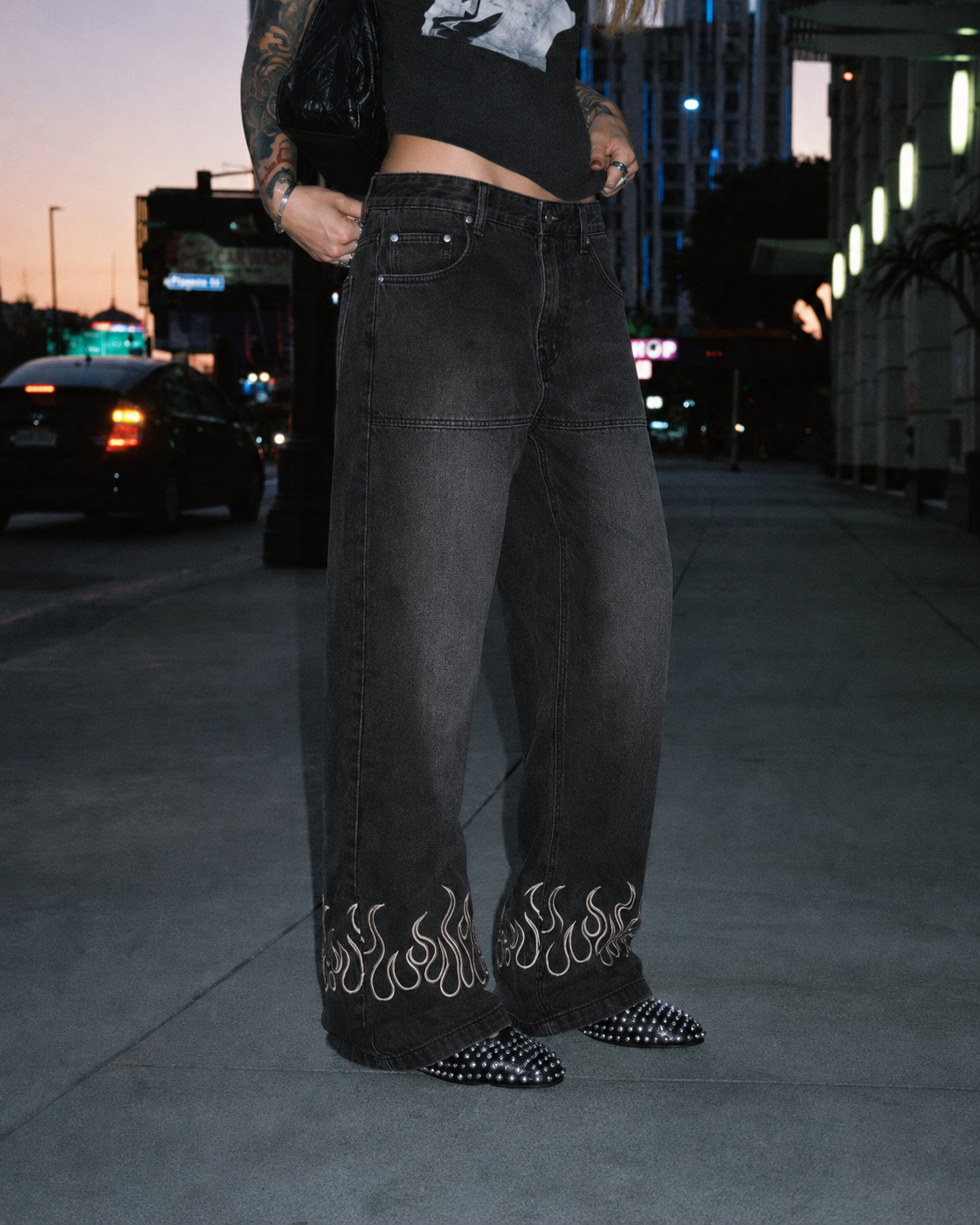Black flame jeans embroidered flame hem detail