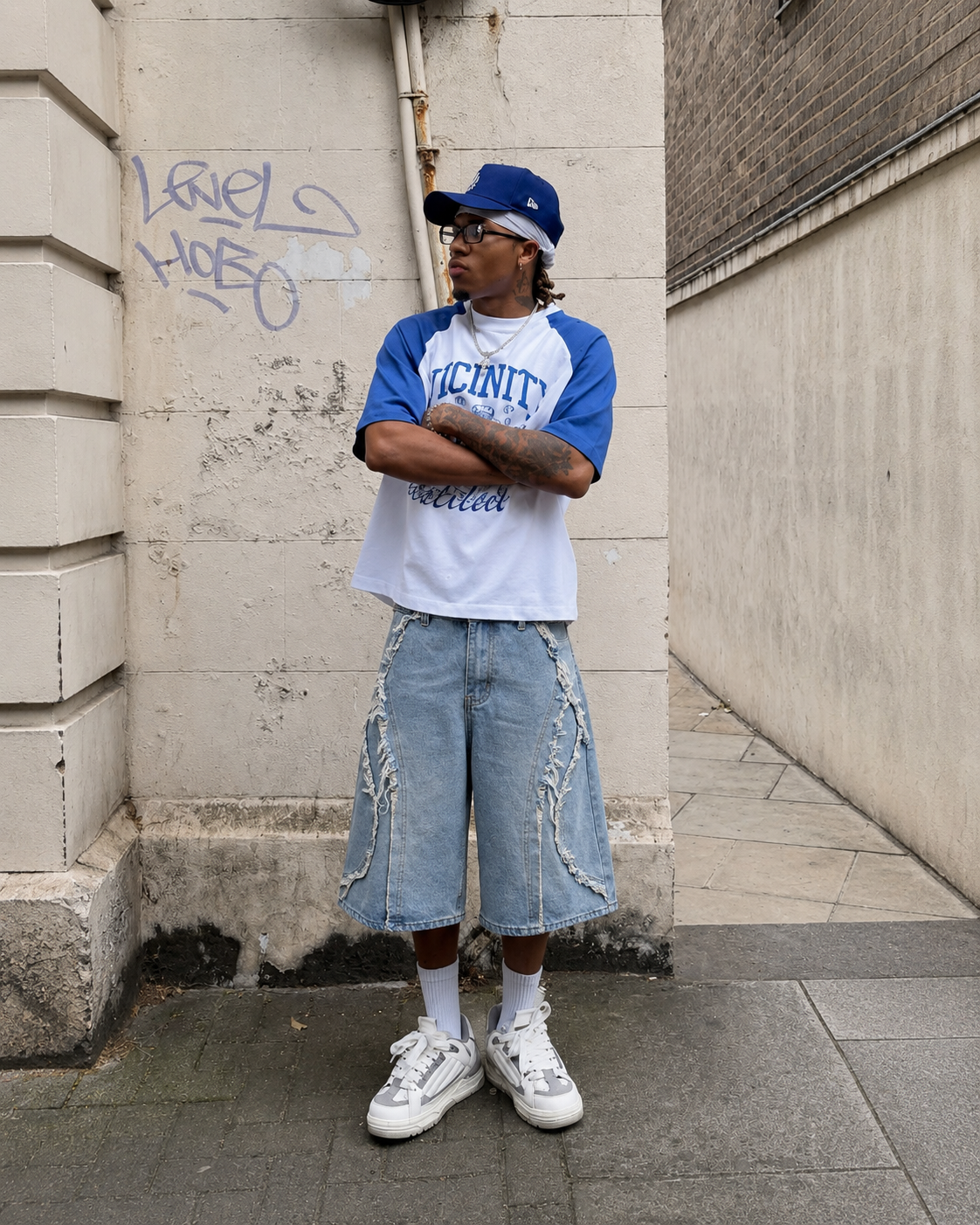 Light blue frayed jorts worn in a full Y2K outfit in London