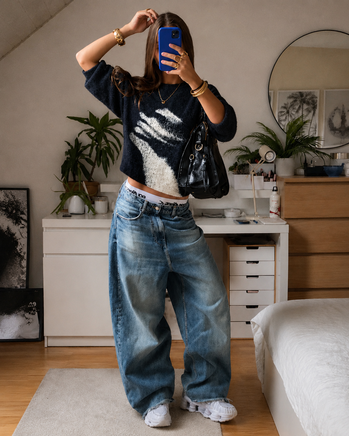 Face graphic sweater in a streetwear mirror look