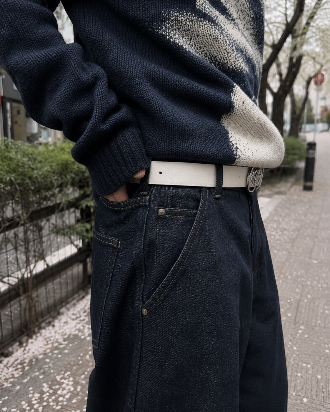 Dark knit sweater side detail and relaxed fit