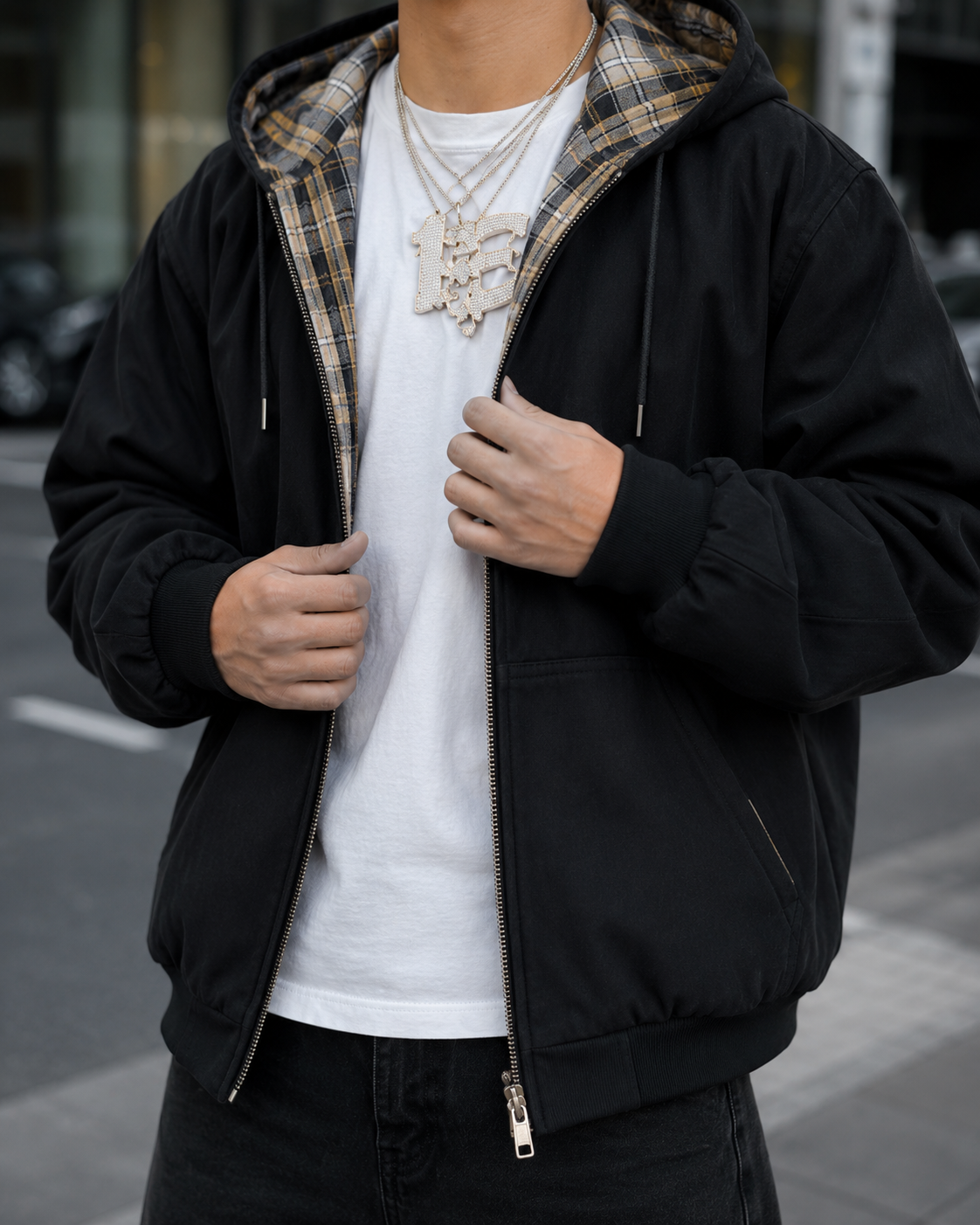 Sweat plaid réversible noir détail zip et doublure à carreaux