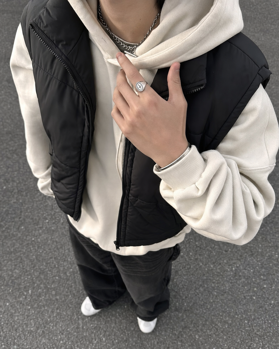 Silver Y2K signet ring worn streetwear hand detail