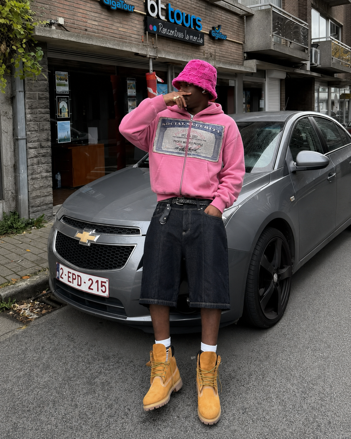 Pink graphic hoodie worn Y2K streetwear