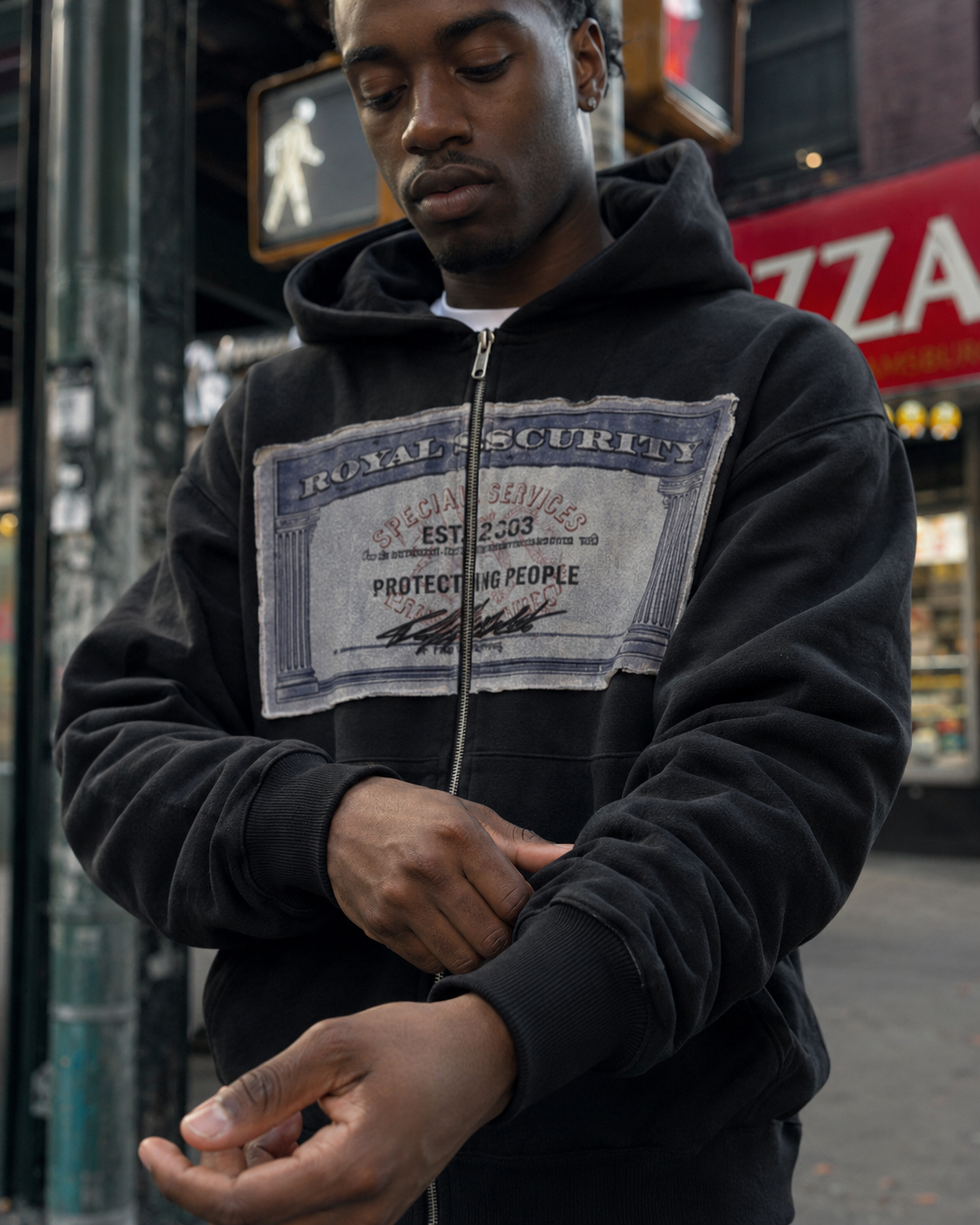 Black zip up hoodie sleeve and rib detail