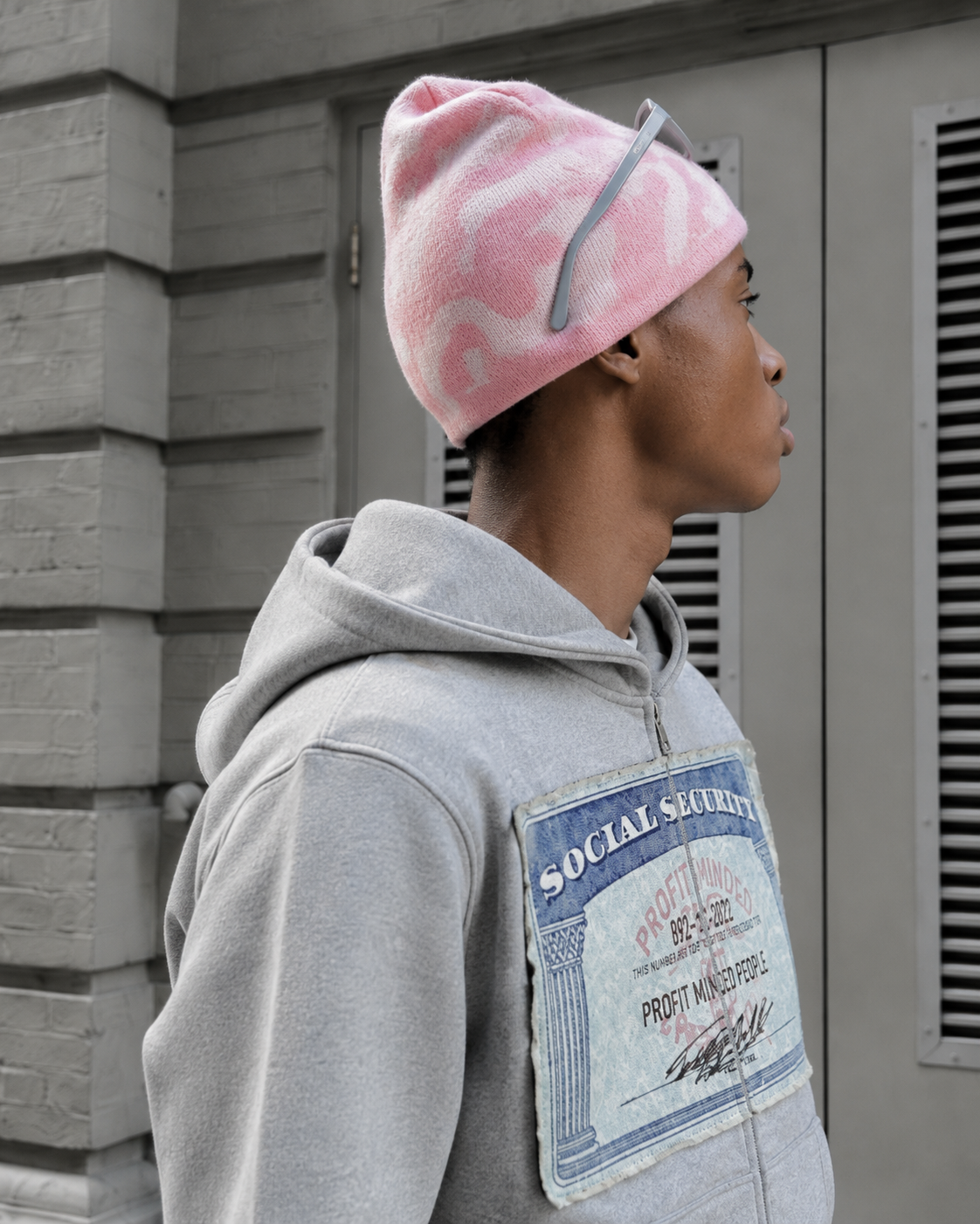 Gray Social Security hoodie side view and chest patch