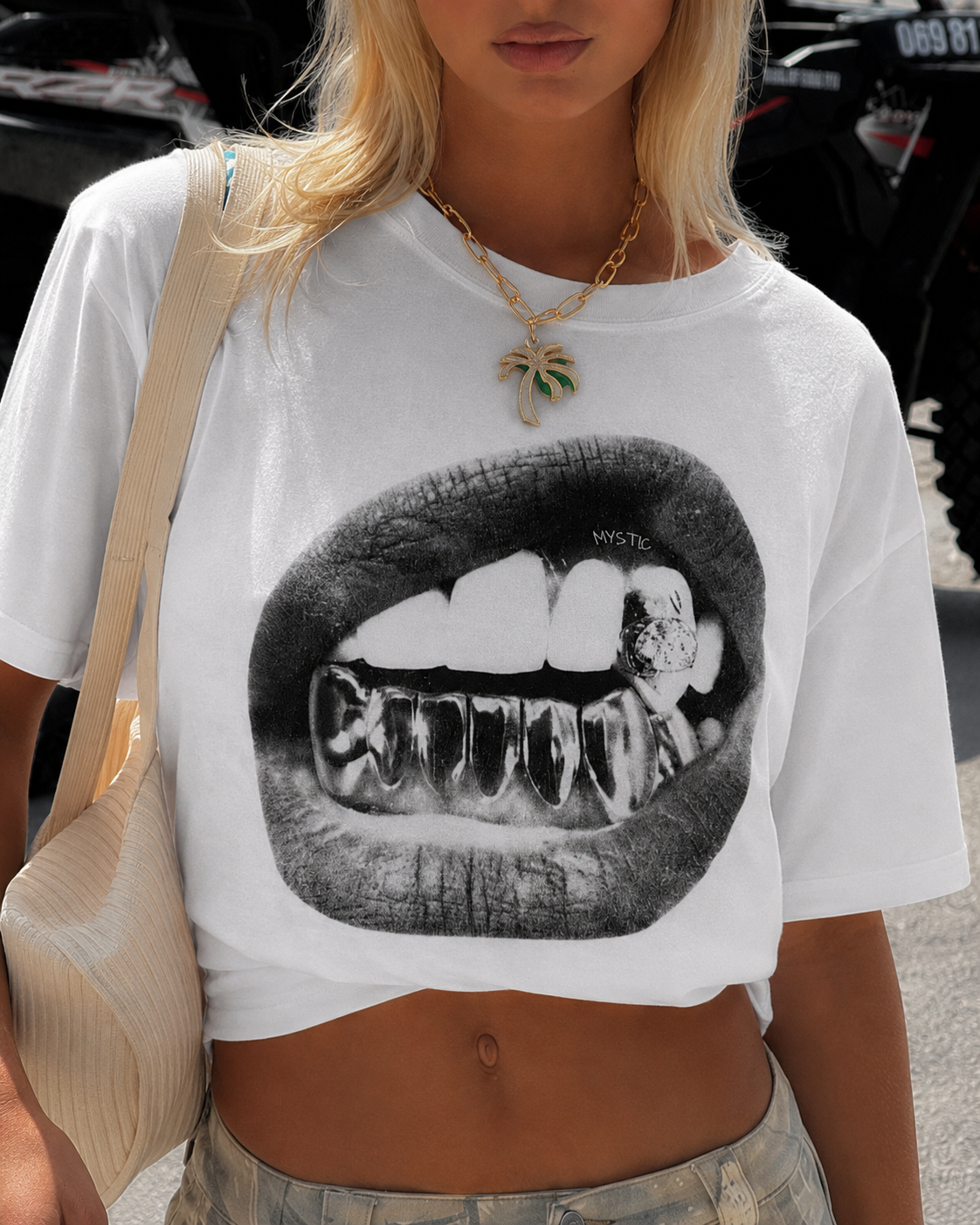 T-shirt graphic Mystic white worn with print grillz close-up streetwear