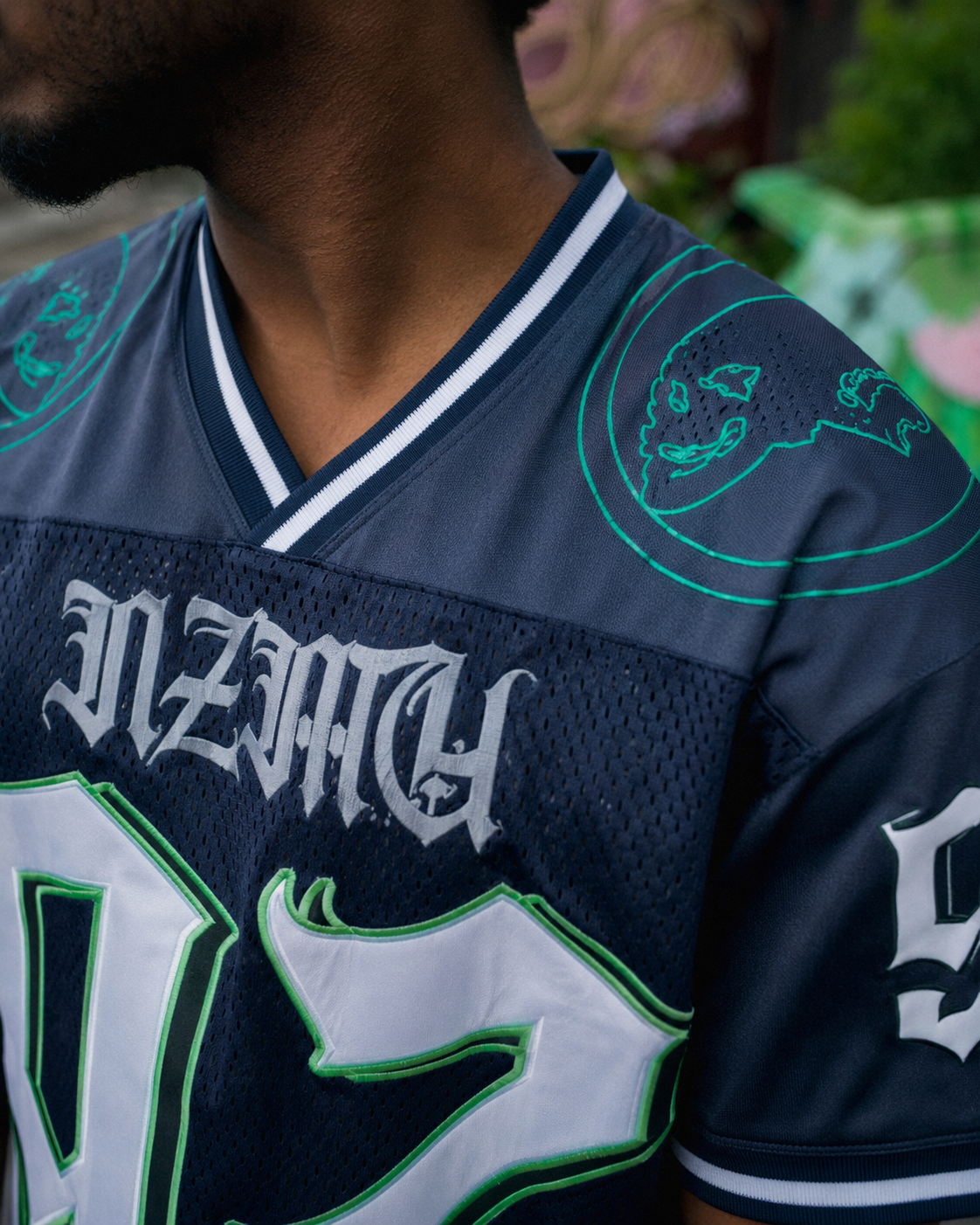 Navy vintage football jersey chest and shoulder detail
